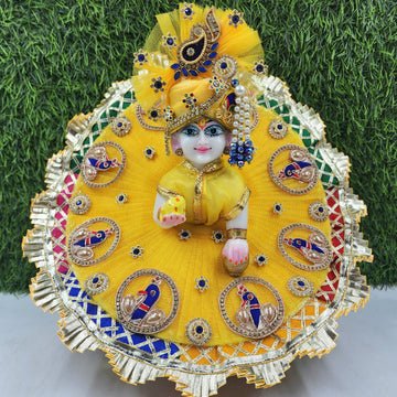 **Title:** "Designer Yellow Mor Heavy Dress for Laddu Gopal Ji | Fancy Kanha Ji Poshak | Bal Gopal Dress for Janmashtami | Size 0-6"

This title is optimized for search engines and eCommerce platforms while remaining clear and appealing to potential custo