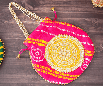 Handmade Pink Bhandhej Silk Potli with Pearl Handle - Perfect for Laddu Gopal Dress, Kanha Ji Poshak, Bal Gopal Dress, and Janmashtami Celebrations